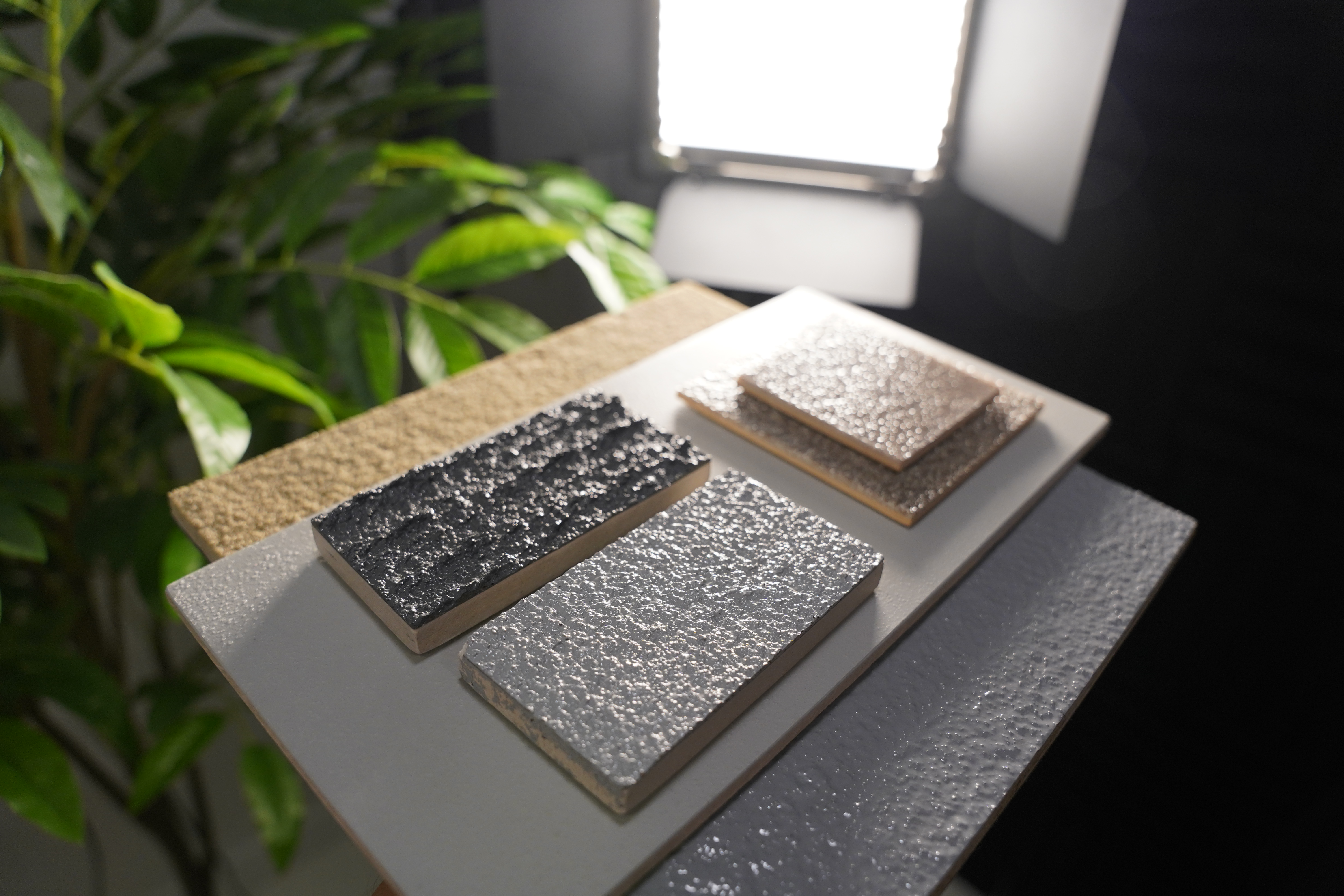 Levels of concrete coating traction additives