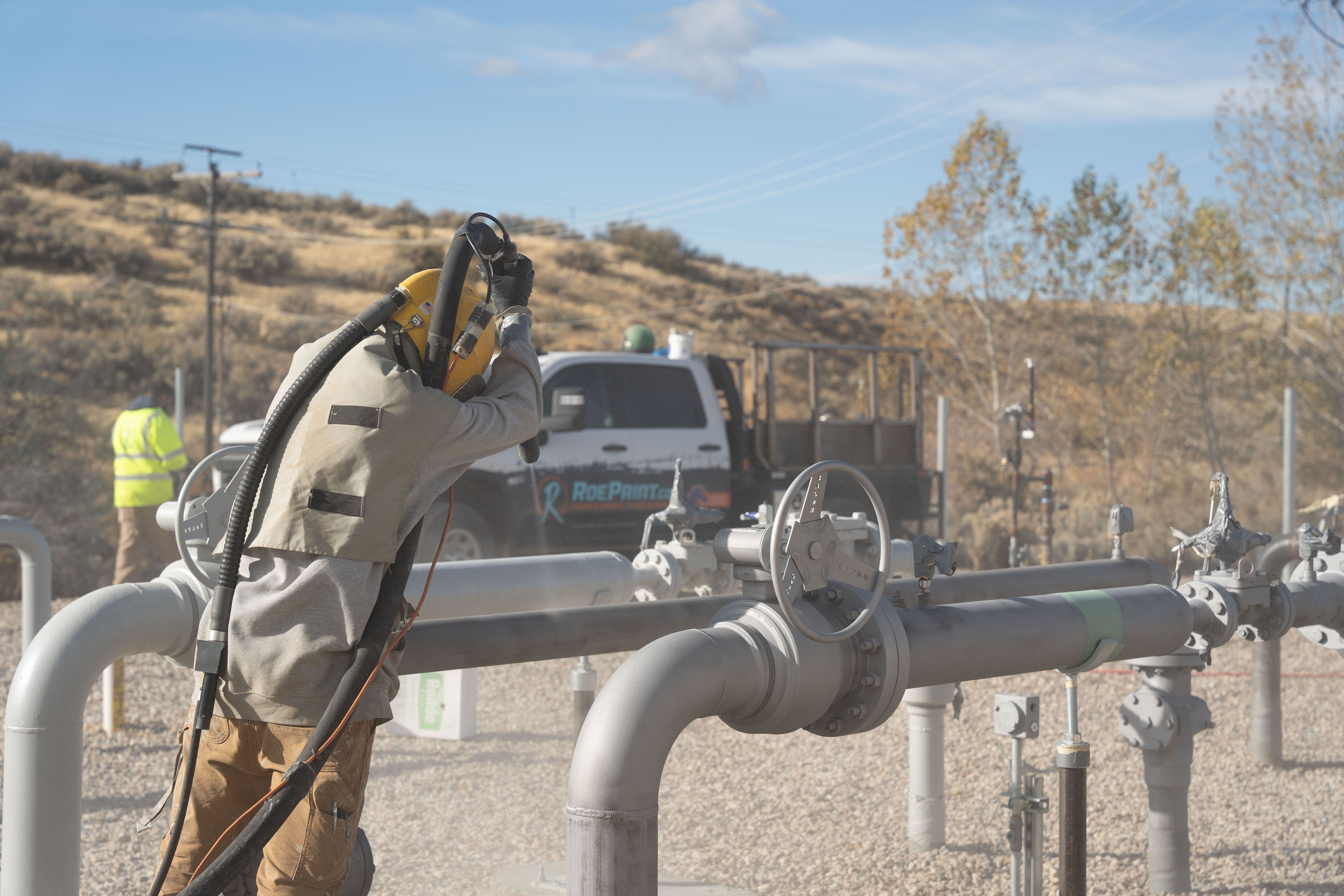 industrial coatings application on a utility site