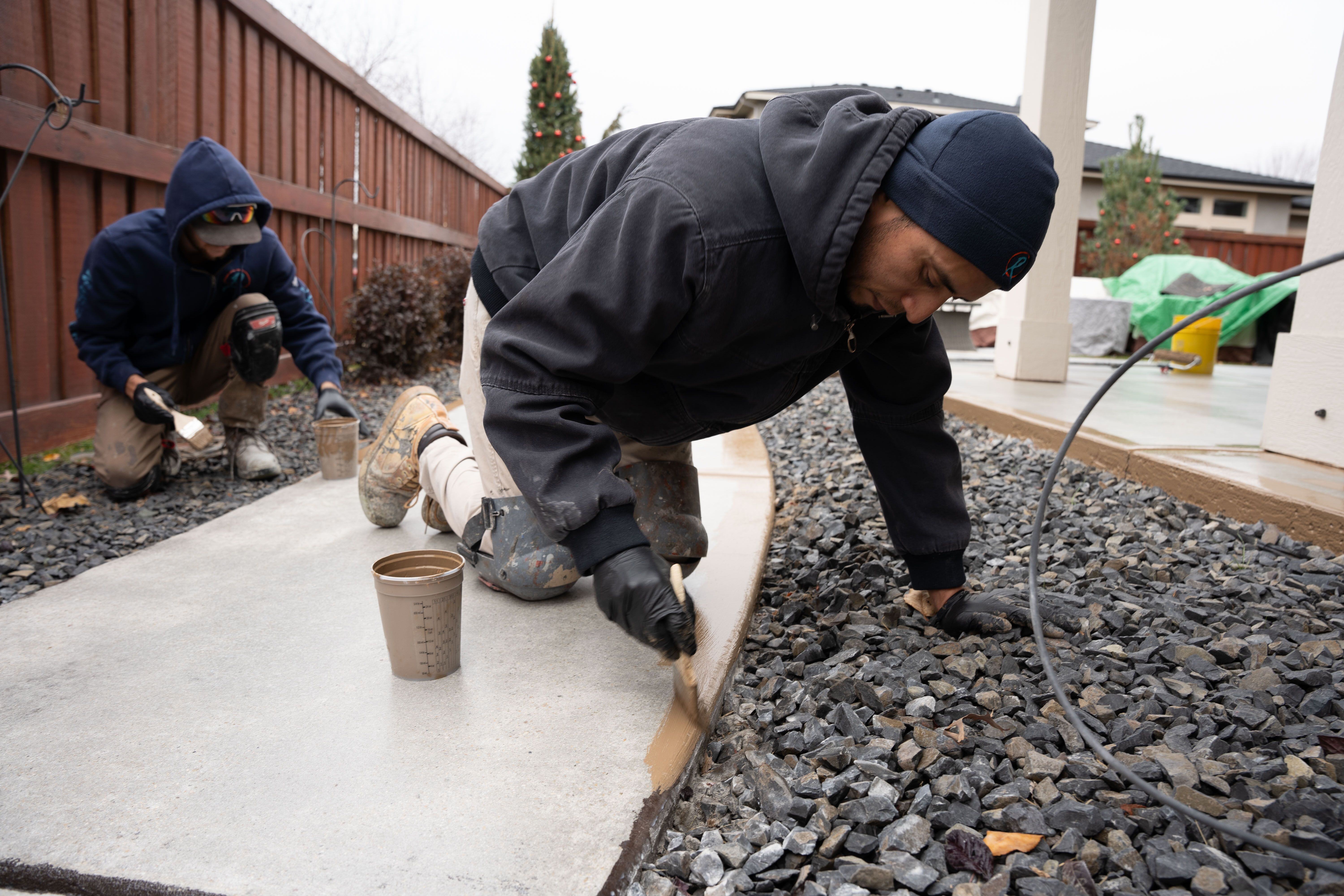 11 10 concrete coating system being applied on a back patio