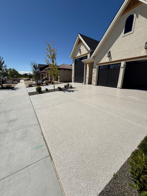 polyaspartic driveway concrete coating in an earth tone