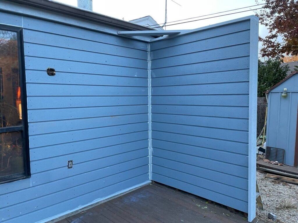 photo of exterior siding after being painted or stained